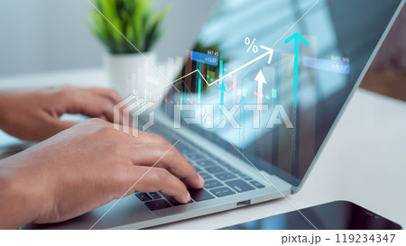 Businesswoman is showing a growing virtual hologram of analytics dashboard with charts, Stock market, Business growth, Progress or success concept, Invest in trading, Finance, Sales, Marketing. 119234347