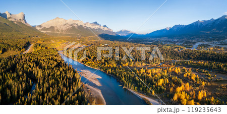 Aerial view of Canadian Rockies mountain range and Bow river forest in autumn morning. Canmore, Alberta, Canada. Mount Rundle. 119235643