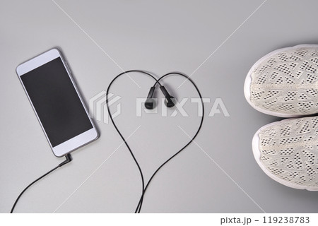 Fitness motivation with smartphone and earphones active lifestyle inspiration 119238783