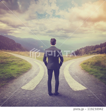 Businessman making decision choosing right path at crossroads Businessman making decision choosing right path at crossroads 119238942