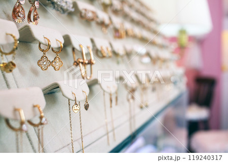 Jinju-si, Gyeongsangnam-do, Republic of Korea - 2024-01-10: Beautiful 24K gold jewelry with designs similar to luxury items on display at a Korean jewelry store Jinju-si, Gyeongsangnam-do, Republic of Korea - 2024-01-10: Beautiful 24K gold jewelry with designs similar to luxury items on display at a Korean jewelry store 119240317