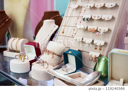 Jinju-si, Gyeongsangnam-do, Republic of Korea - 2024-01-10: Beautiful 24K gold jewelry with designs similar to luxury items on display at a Korean jewelry store 119240366