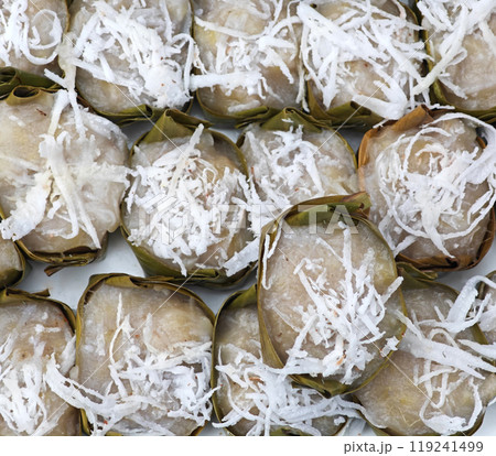 steamed banana cake with coconut in banana leaf cup 119241499