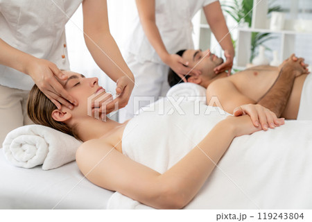 Caucasian couple enjoying relaxing anti-stress head massage. Quiescent 119243804