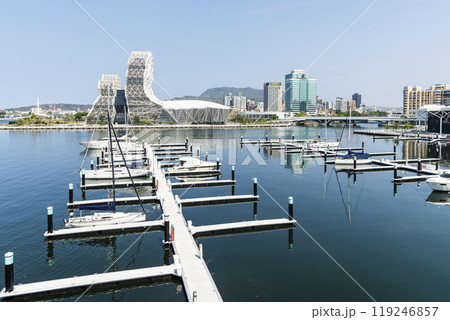 View of Yacht Marina at Glory Pier of Kaohsiung Port, Taiwan. with the Kaohsiung Music Center building. View of Yacht Marina at Glory Pier of Kaohsiung Port, Taiwan. with the Kaohsiung Music Center building. 119246857