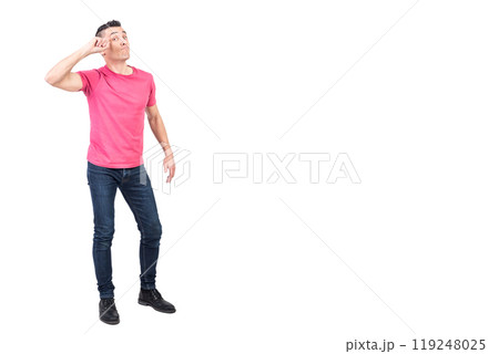 Smart guy touching forehead and looking at camera Smart guy touching forehead and looking at camera 119248025