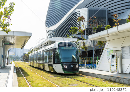 The circular light rail train drives past the Kaohsiung Port Cruise Terminal station in Taiwan. 119248272