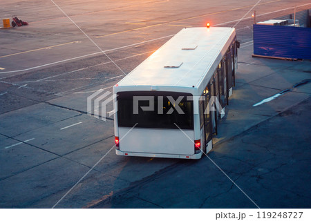 Airport shuttle bus at the morning airport near the terminal under construction 119248727