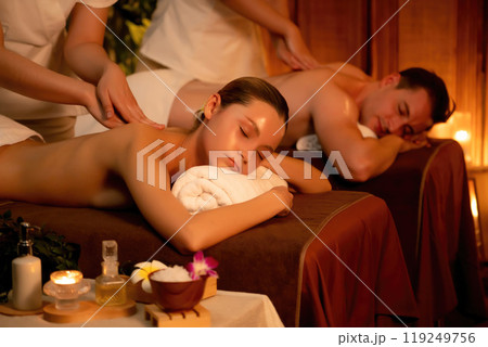 Caucasian couple customer enjoying relaxing anti-stress massage. Quiescent 119249756