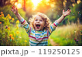 Portrait of happy child. Funny kid outdoor in park. 119250125