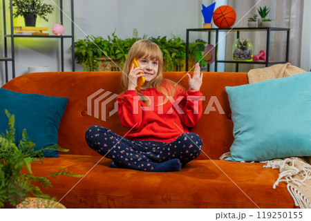 Happy surprised child girl having pleasant conversation phone call good news enjoying talking gossip 119250155