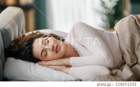woman is sleeping in the bedroom woman is sleeping in the bedroom 119251335