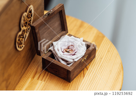 Wedding ceremony. Wedding rings are in beautiful box on the table 119253692
