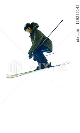 Leaping mid-air, skier bends slightly forward, maintaining balance and control. Thrilling snapshot of high-flying adventure. Leaping mid-air, skier bends slightly forward, maintaining balance and control. Thrilling snapshot of high-flying adventure. 119255143