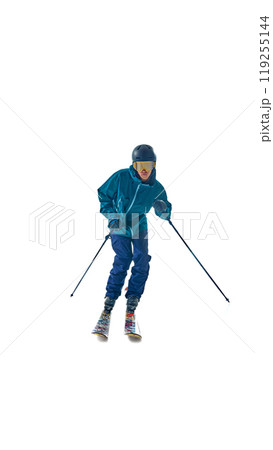 In low stance, skier races downhill with precision, showcasing thrill and speed of skiing in action against white studio background. In low stance, skier races downhill with precision, showcasing thrill and speed of skiing in action against white studio background. 119255144
