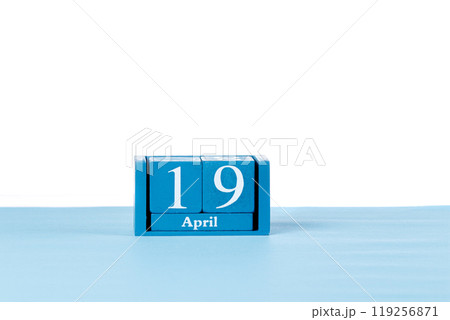 Wooden calendar April 19 on a white background Wooden calendar April 19 on a white background 119256871