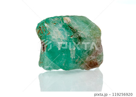 macro mineral stone emerald on a white background macro mineral stone emerald on a white background 119256920