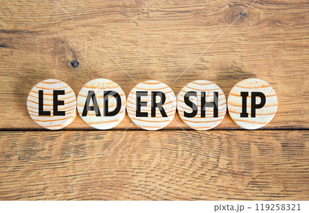 Leadership symbol. Concept word Leadership on beautiful wooden circles. Beautiful wooden background. Business leadership concept. Copy space. Leadership symbol. Concept word Leadership on beautiful wooden circles. Beautiful wooden background. Business leadership concept. Copy space. 119258321