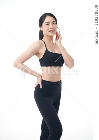 Beautiful young asian sport woman with sportswear ready for exercise on white background, Advertising sportswear and yoga wear, Healthy lifestyle, sport. Beautiful young asian sport woman with sportswear ready for exercise on white background, Advertising sportswear and yoga wear, Healthy lifestyle, sport. 119258539