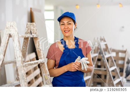 Portrait of smiling asian woman repairer Portrait of smiling asian woman repairer 119260305