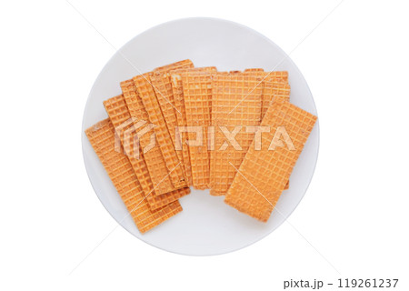 Waffles with chocolate coating. Group of waffles in ceramic plate. Belgian dessert. Isolate on a white background. Top view. 119261237