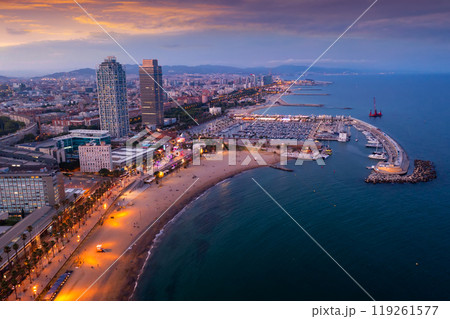Aerial view of Barcelona cityscape on Mediterranean coast at summer twilight Aerial view of Barcelona cityscape on Mediterranean coast at summer twilight 119261577