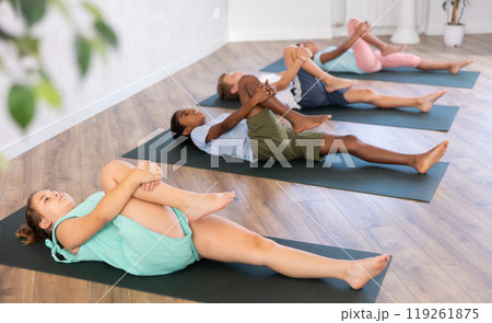 Group of multiethnic children doing pilates in studio Group of multiethnic children doing pilates in studio 119261875