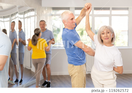 Couple of elderly man and woman dancing waltz Couple of elderly man and woman dancing waltz 119262572