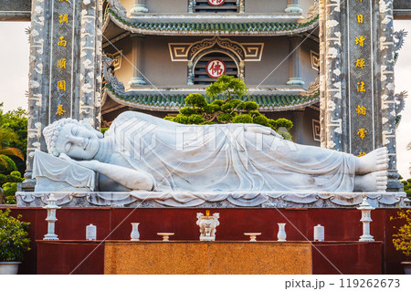 big statue of white reclining Buddha at Buddhist pagoda Thap Xa Loi at Linh Ung in Da Nang in Vietnam in Asia 119262673