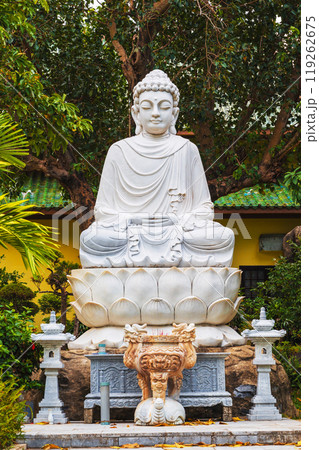 white Buddhist statue of a sitting Buddha in park at the Linh Ung Pagoda in Da Nang in Vietnam in summer in Asia white Buddhist statue of a sitting Buddha in park at the Linh Ung Pagoda in Da Nang in Vietnam in summer in Asia 119262675