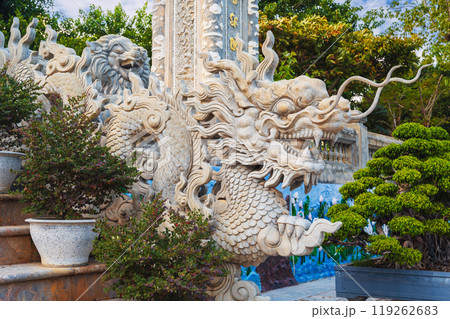 Stone Asian dragon statue on stairs at Linh Ung Buddhist Pagoda in Da Nang in Vietnam in Asia 119262683