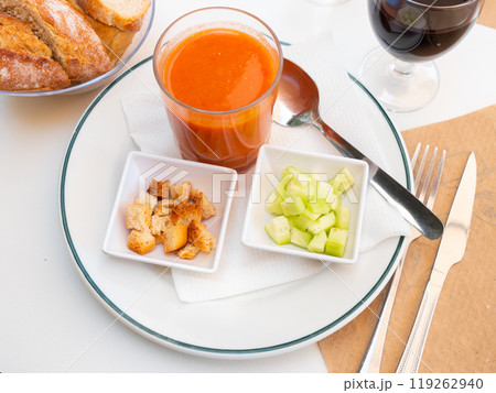 Spanish cold soup Gazpacho with crispy croutons and cucumber 119262940