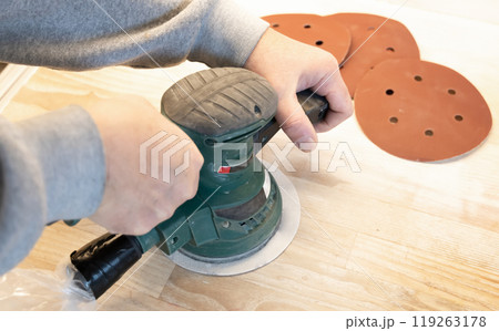 Work with a grinder on wood. Work tool. Work with a grinder on wood. Work tool. 119263178