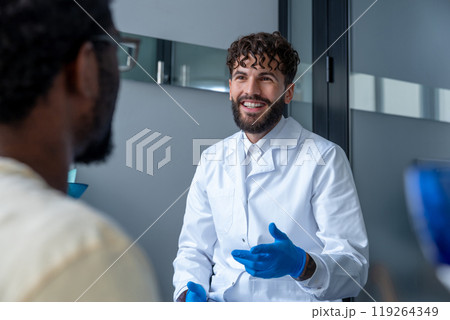 Dentist providing checkup for oral health and preventive care during consultation with patient 119264349