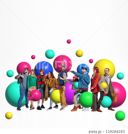 Shoppers stand amazed among colorful balls, pointing. Trying to get best Black Friday offer. Creative colorful collage. 119268283