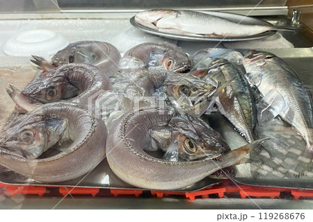 Raw fish in a store window, fresh seafood Raw fish in a store window, fresh seafood 119268676