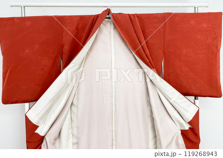 Colorful kimono robe on a hanger, promo photo for an online women's clothing store 119268943