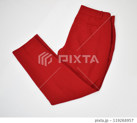 Folded red office pants on white Folded red office pants on white 119268957
