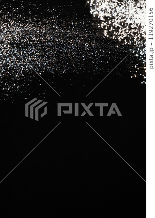 Abstract black and white background of pouring flour, space for text Abstract black and white background of pouring flour, space for text 119270156