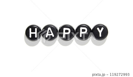 Black stones with white letters forming the word happy on white background Black stones with white letters forming the word happy on white background 119272993