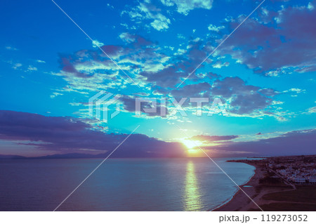 View of above of seascape with mountains at sunset. Rockies in the evening. View of Mount Olympus on the horizon. Beautiful nature of Greece 119273052