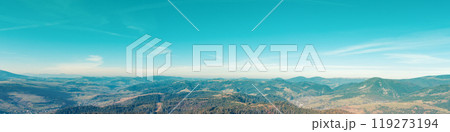 Panoramic aerial view of colorful slopes of mountains on a sunny day. View of the mountains in autumn. Beautiful nature landscape. Carpathian mountains. Ukraine Panoramic aerial view of colorful slopes of mountains on a sunny day. View of the mountains in autumn. Beautiful nature landscape. Carpathian mountains. Ukraine 119273194