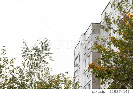 High-rise apartment buildings in a residential area with greenery, offering insights into urban 119274141