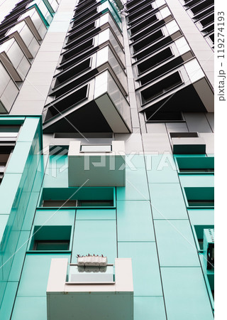 High-rise apartment buildings in a residential area showcasing modern architecture and rental 119274193