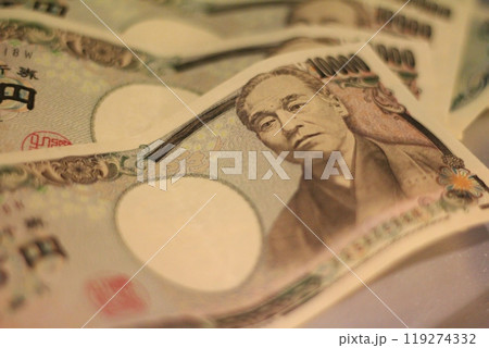 Fukuoka-shi, Fukuoka-Ken, Hakata-ku, Japan - October 13, 2024: Japan's banknotes will undergo a currency reform with a new design. 100,000 yen paper note, currency Fukuoka-shi, Fukuoka-Ken, Hakata-ku, Japan - October 13, 2024: Japan's banknotes will undergo a currency reform with a new design. 100,000 yen paper note, currency 119274332