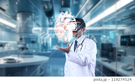 Doctor with VR headset pointing at heart hologram at laboratory. Apparatus. 119274524