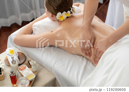 Caucasian woman customer enjoying relaxing anti-stress massage. Quiescent 119280608