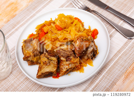 Plate of braised sauerkraut with fried pork meat Plate of braised sauerkraut with fried pork meat 119280972
