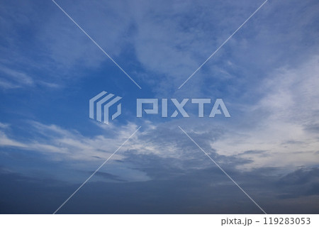 Tropical summer blue sky fluffy white cloud summertime on light sunny day cloudscape. Clear bright blue skyline spring sunlight climate background. Heaven blue environment ecology high scenic nature. Tropical summer blue sky fluffy white cloud summertime on light sunny day cloudscape. Clear bright blue skyline spring sunlight climate background. Heaven blue environment ecology high scenic nature. 119283053
