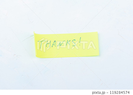 Sticky note with THANKS written on it. Sticky note with THANKS written on it. 119284574